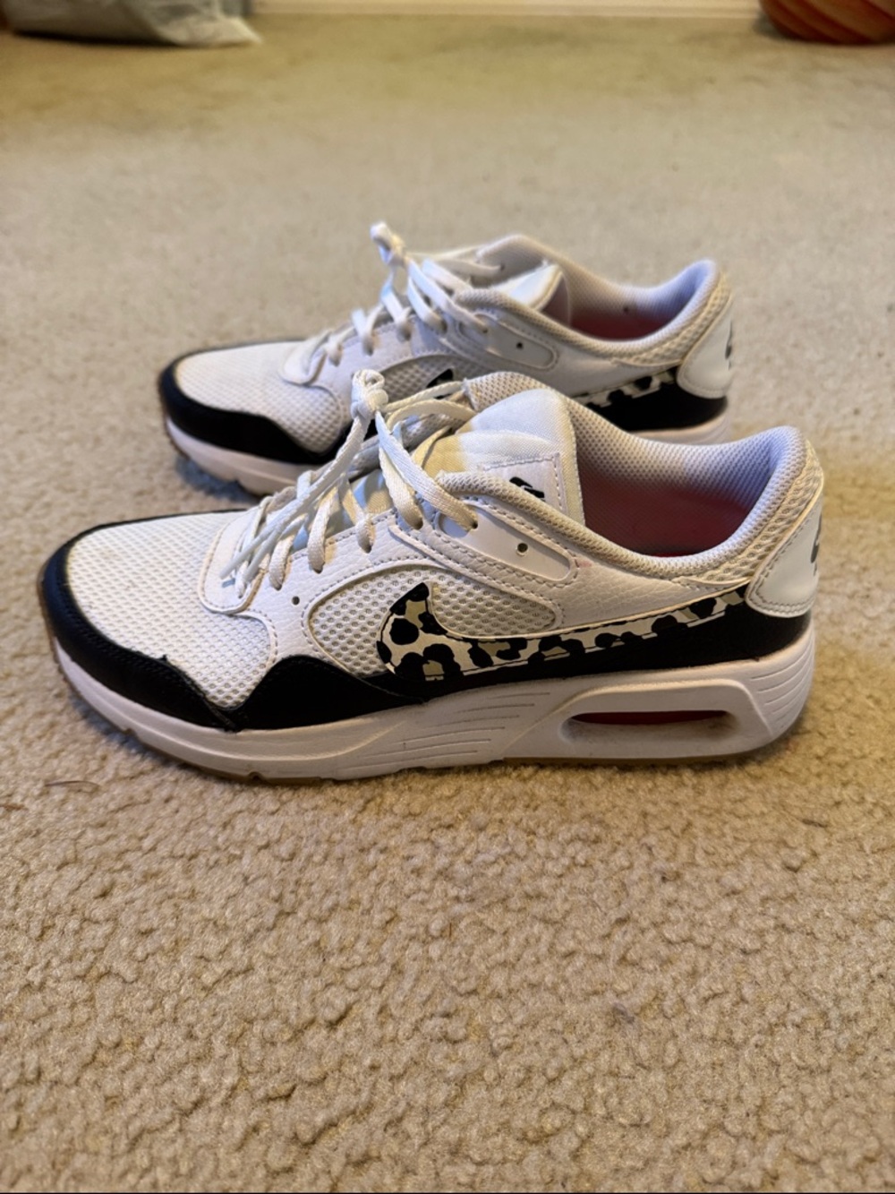 Nike White Athletic Sneakers with Leopard Swoosh
